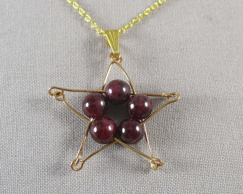 Garnet Star Gold Tone Necklace 1pc (0655)